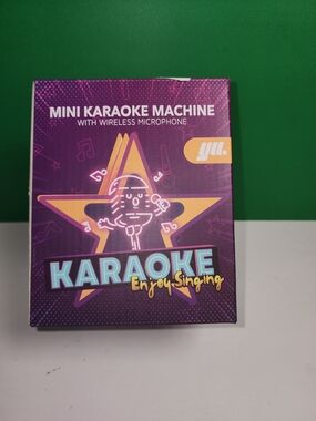 Portable mini karaoke machine with a wireless microphone